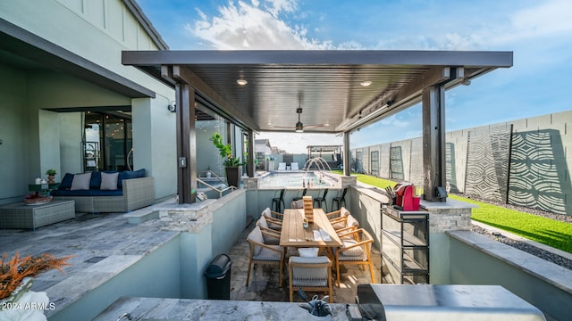 view of patio with outdoor lounge area and a bar