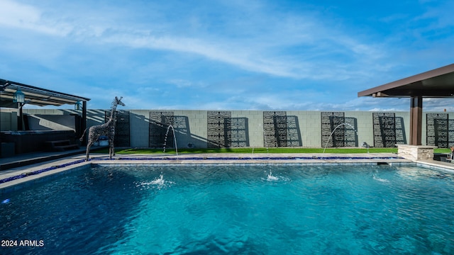 view of pool featuring pool water feature