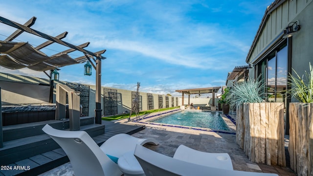 view of swimming pool featuring a patio area, pool water feature, and a pergola