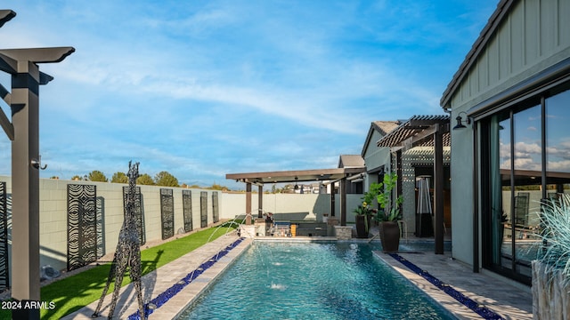 view of pool featuring a patio, a pergola, and pool water feature