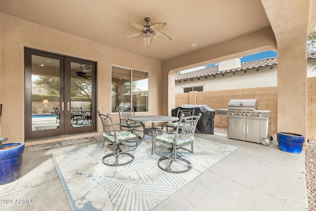 view of patio / terrace featuring french doors, area for grilling, and ceiling fan