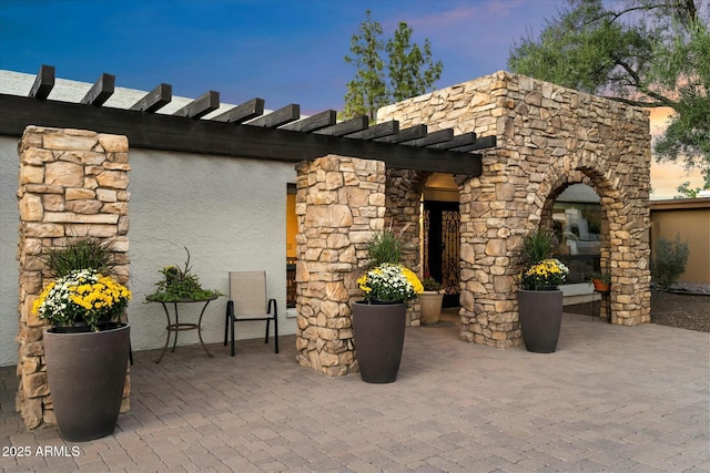 view of patio / terrace featuring a pergola