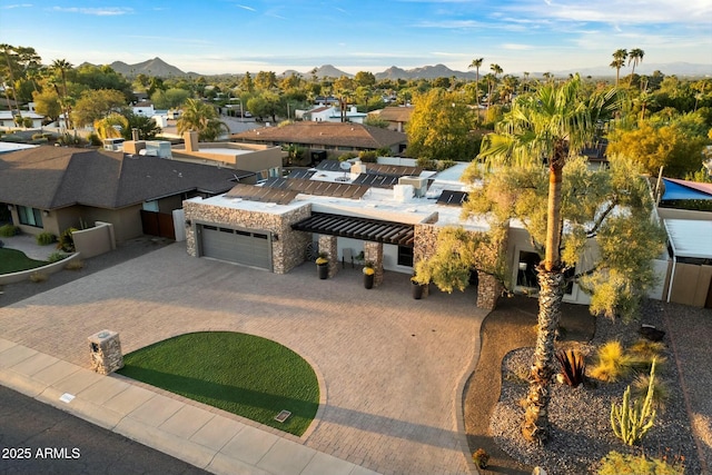 drone / aerial view with a residential view and a mountain view