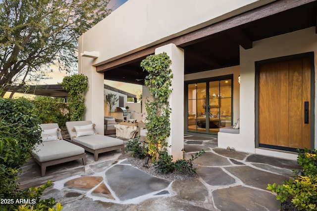 view of patio featuring french doors