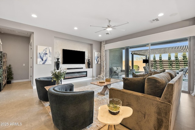 living room featuring ceiling fan