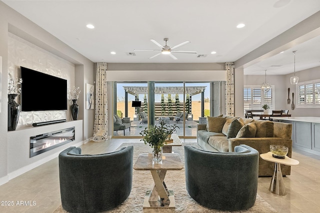 living room with ceiling fan