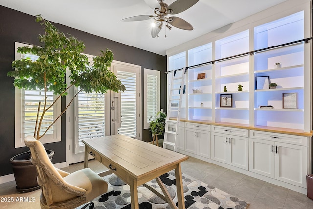 office area with ceiling fan