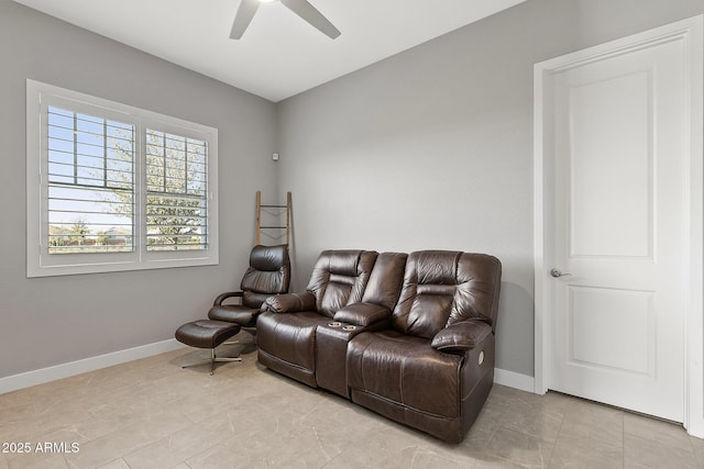 interior space featuring ceiling fan and light tile patterned floors