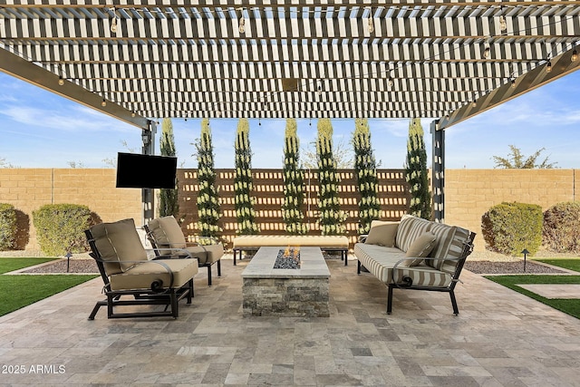 view of patio / terrace with a pergola and an outdoor living space with a fire pit