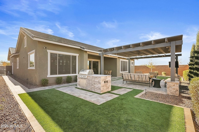 rear view of property featuring a pergola, area for grilling, a lawn, a patio area, and an outdoor hangout area