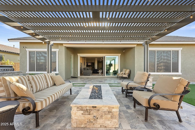 view of patio featuring an outdoor living space with a fire pit and a pergola