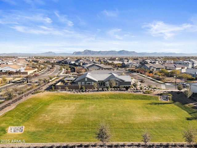 birds eye view of property featuring a mountain view