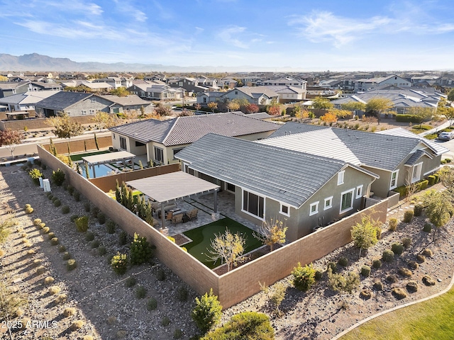 drone / aerial view featuring a mountain view