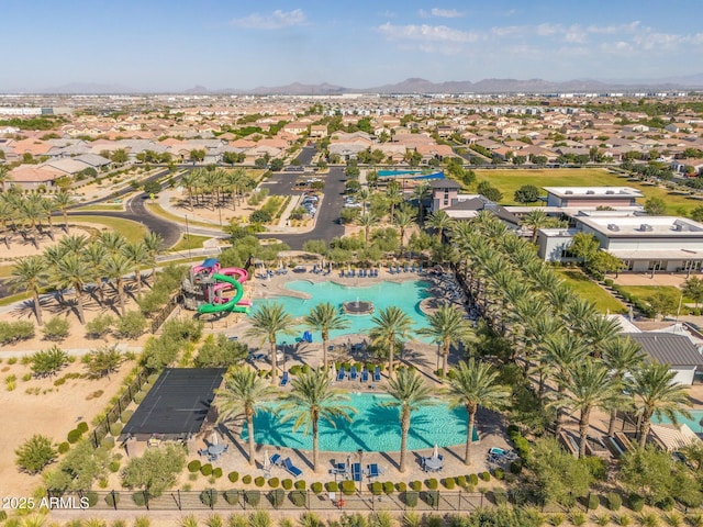 birds eye view of property featuring a mountain view