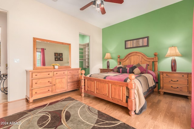 bedroom featuring ceiling fan and light wood-type flooring