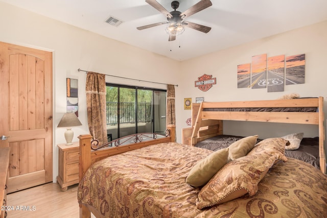 bedroom with light wood-type flooring, ceiling fan, and access to exterior