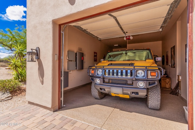 garage featuring a carport