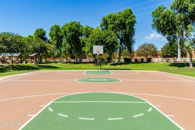 view of basketball court featuring community basketball court and a yard