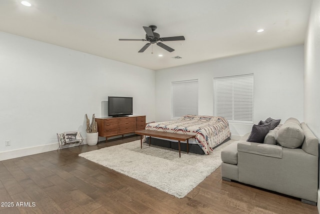 bedroom with ceiling fan, dark wood-type flooring, baseboards, and recessed lighting