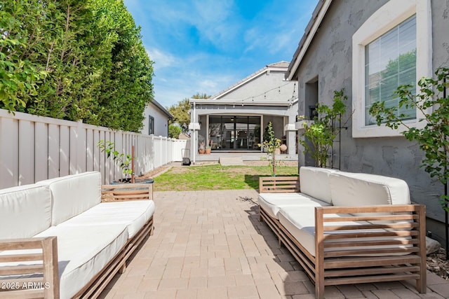 view of patio / terrace featuring a fenced backyard and outdoor lounge area