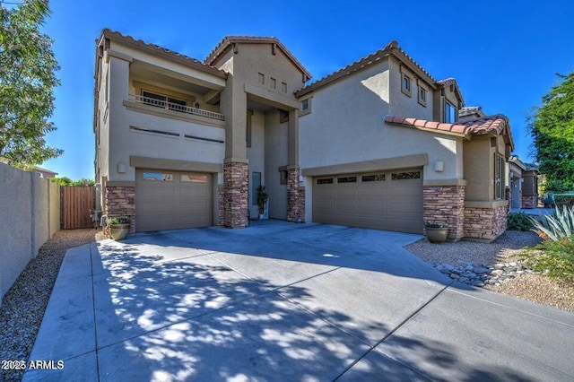 view of front of house with a garage and a balcony