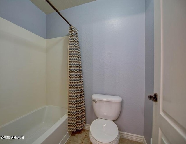 bathroom with toilet, shower / bathtub combination with curtain, and tile patterned floors