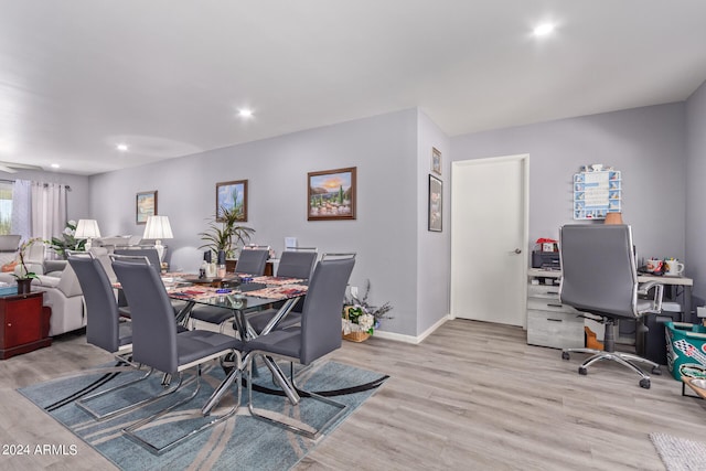 dining area with light wood-type flooring