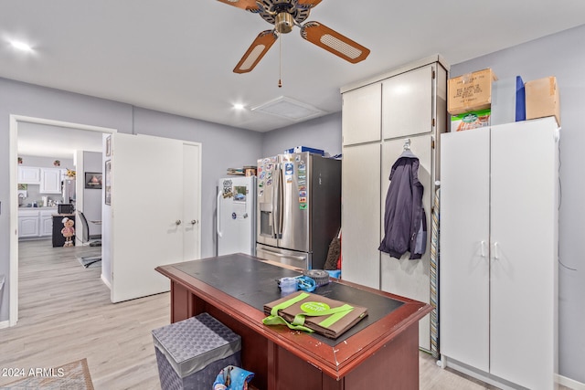 office space with ceiling fan and light hardwood / wood-style flooring