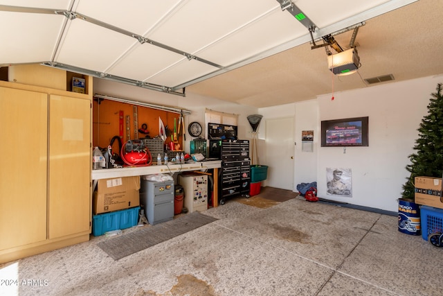 garage featuring a garage door opener