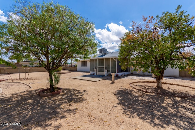 view of yard with a sunroom