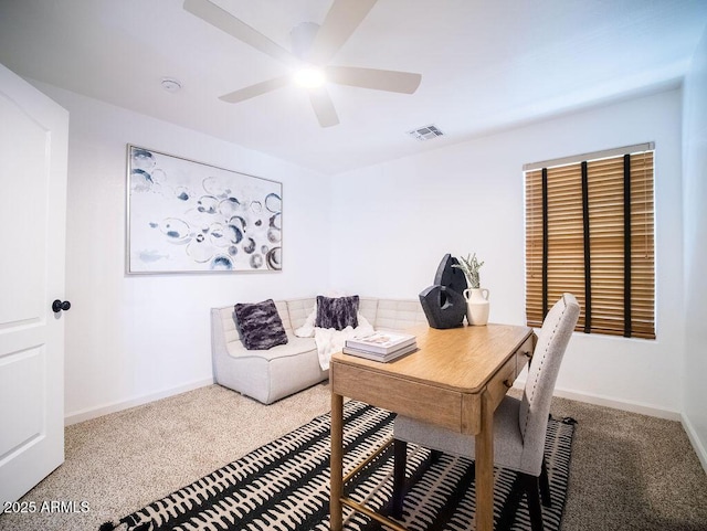 office with ceiling fan and carpet floors