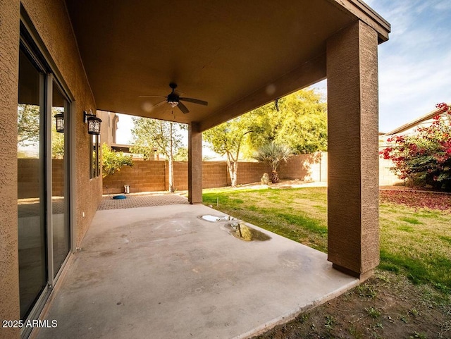 view of patio / terrace featuring ceiling fan