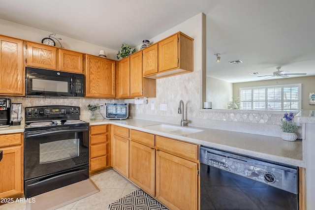 kitchen featuring backsplash, black appliances, sink, ceiling fan, and light tile patterned floors