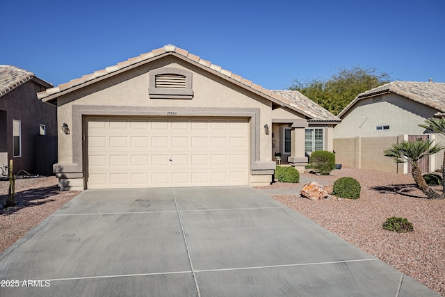 single story home featuring a garage