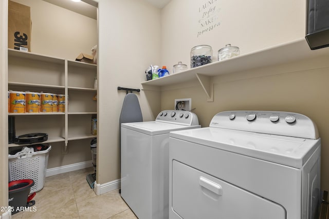 25969 W Tina Ln, Buckeye, AZ 85396 - laundry area with washer and clothes dryer and light tile patterned flooring