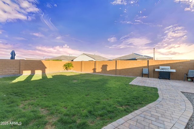 25969 W Tina Ln, Buckeye, AZ 85396 - fenced backyard with a patio