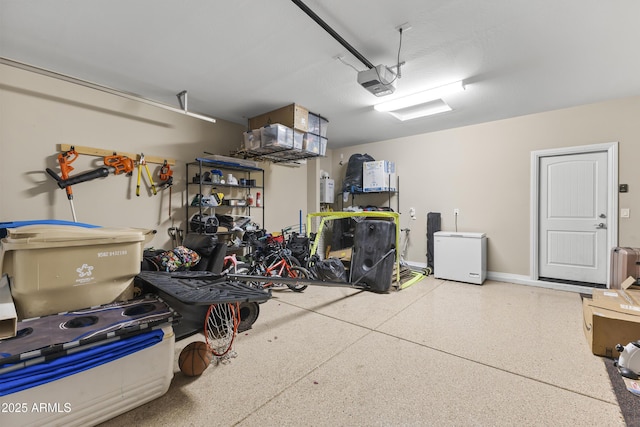 25969 W Tina Ln, Buckeye, AZ 85396 - garage featuring fridge and a garage door opener