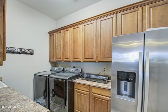 laundry room with washer and clothes dryer