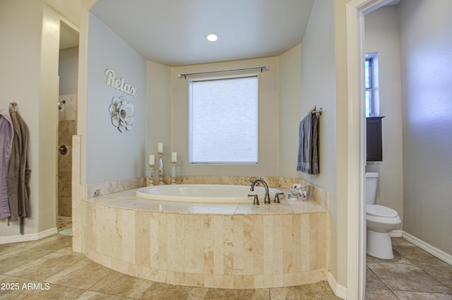 full bath featuring tile patterned flooring, a garden tub, a tile shower, and toilet