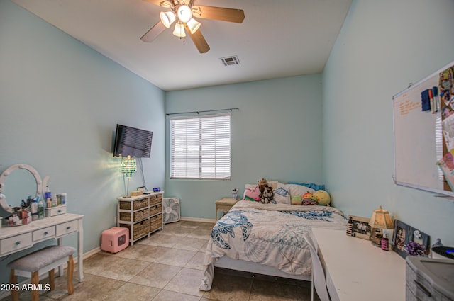 bedroom with baseboards, visible vents, a ceiling fan, and light tile patterned flooring