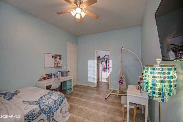 bedroom featuring ceiling fan and light tile patterned flooring