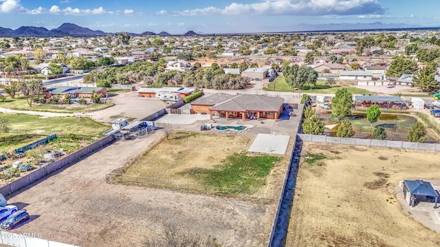 drone / aerial view with a residential view and a mountain view