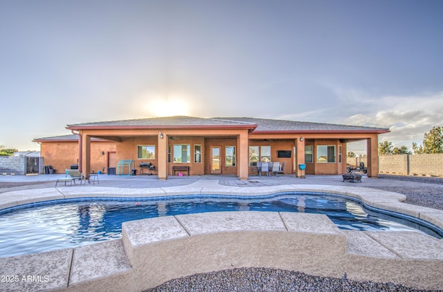 view of swimming pool with a fenced in pool, a patio area, and fence