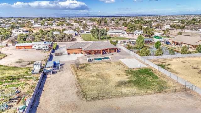 birds eye view of property with a residential view and a mountain view