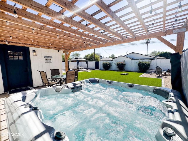 view of patio with a hot tub, a gazebo, and a pergola