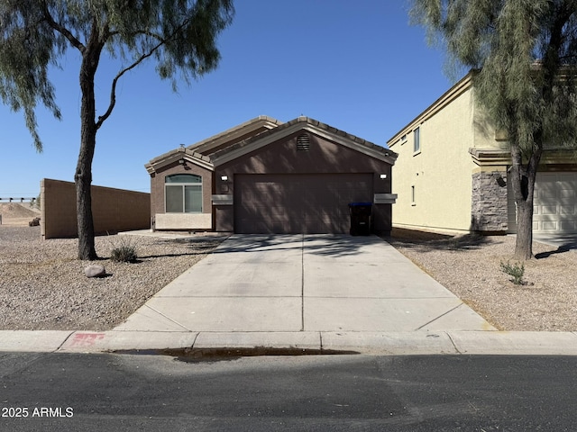 43213 W Cowpath Rd, Maricopa, AZ 85138 - ranch-style home with an attached garage, driveway, and stucco siding