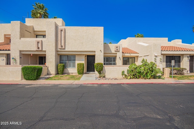 714 E Morningside Dr, Phoenix, AZ 85022 - view of front of home featuring a tiled roof and stucco siding