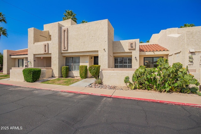 714 E Morningside Dr, Phoenix, AZ 85022 - view of front of home featuring stucco siding and a tile roof