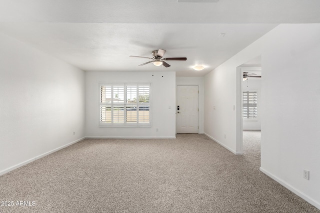 714 E Morningside Dr, Phoenix, AZ 85022 - spare room featuring carpet flooring, a ceiling fan, and baseboards