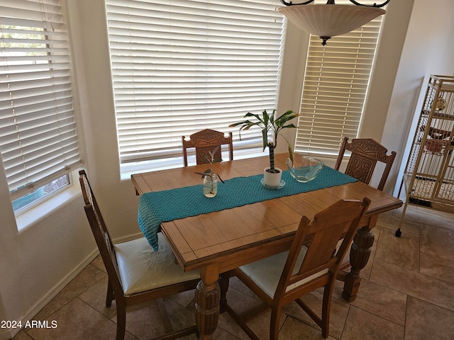 dining area featuring tile patterned flooring